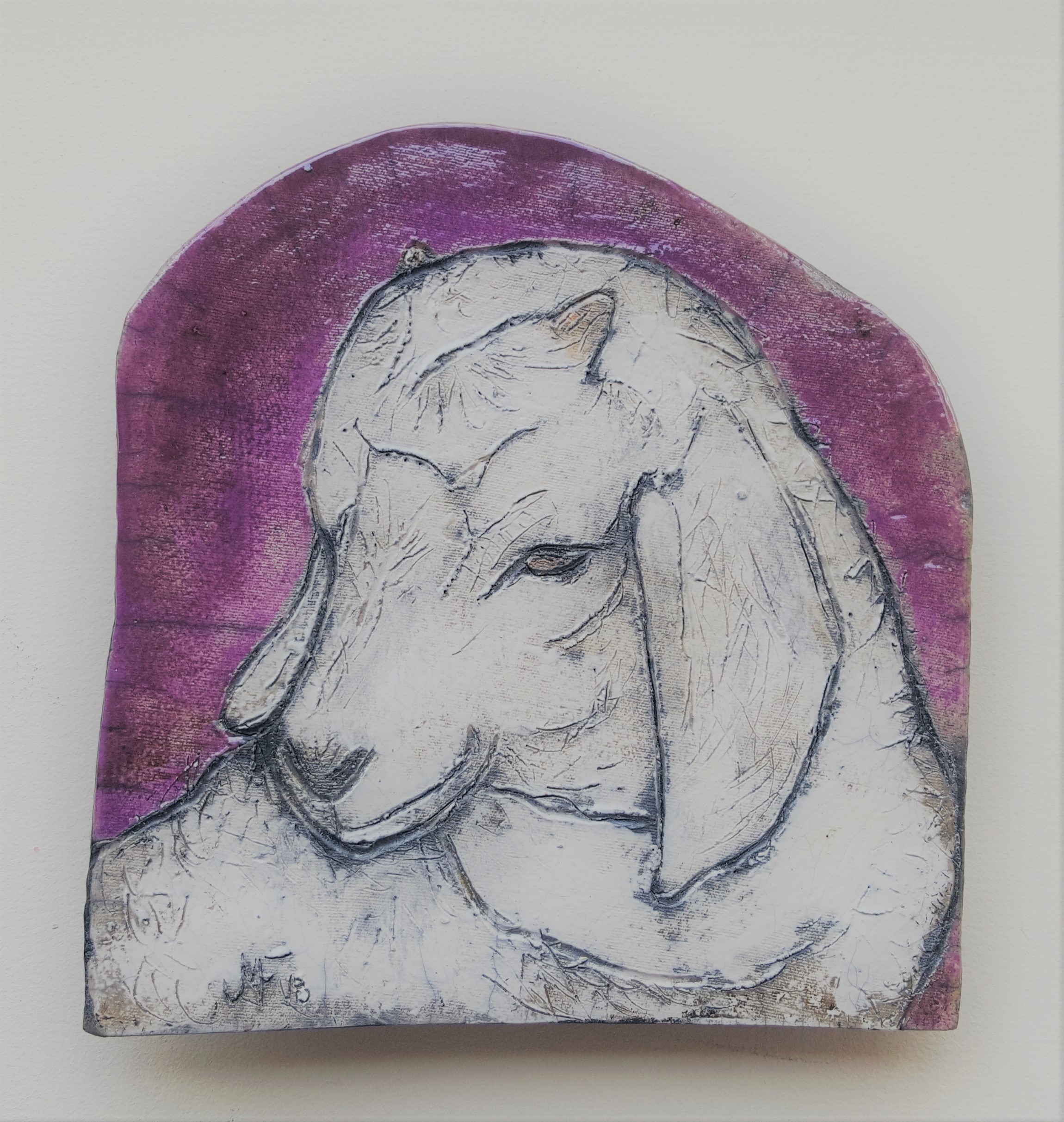 Baby goat using process of Raku firing. Artist Julie Fakler
